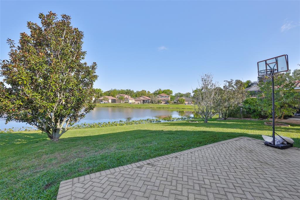 5779 Aaron Court Sarasota, FL 34232 - Photo 29 of 39 a view of a park and trees with a big yard