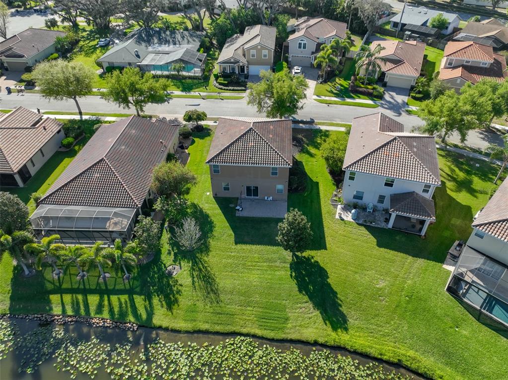5779 Aaron Court Sarasota, FL 34232 - Photo 3 of 39 an aerial view of multiple houses with yard