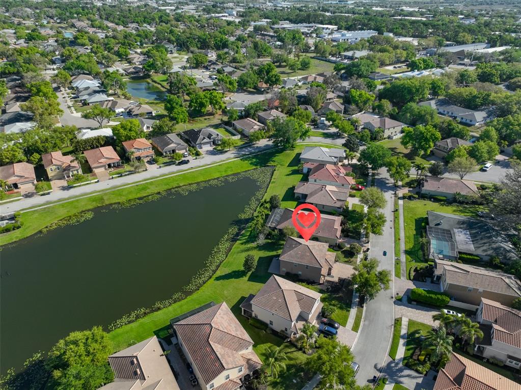 5779 Aaron Court Sarasota, FL 34232 - Photo 33 of 39 an aerial view of lake and residential houses with outdoor space