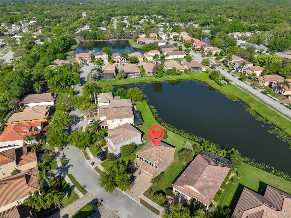 5779 Aaron Court Sarasota, FL 34232 - Photo 34 of 39 an aerial view of residential houses with outdoor space and street view