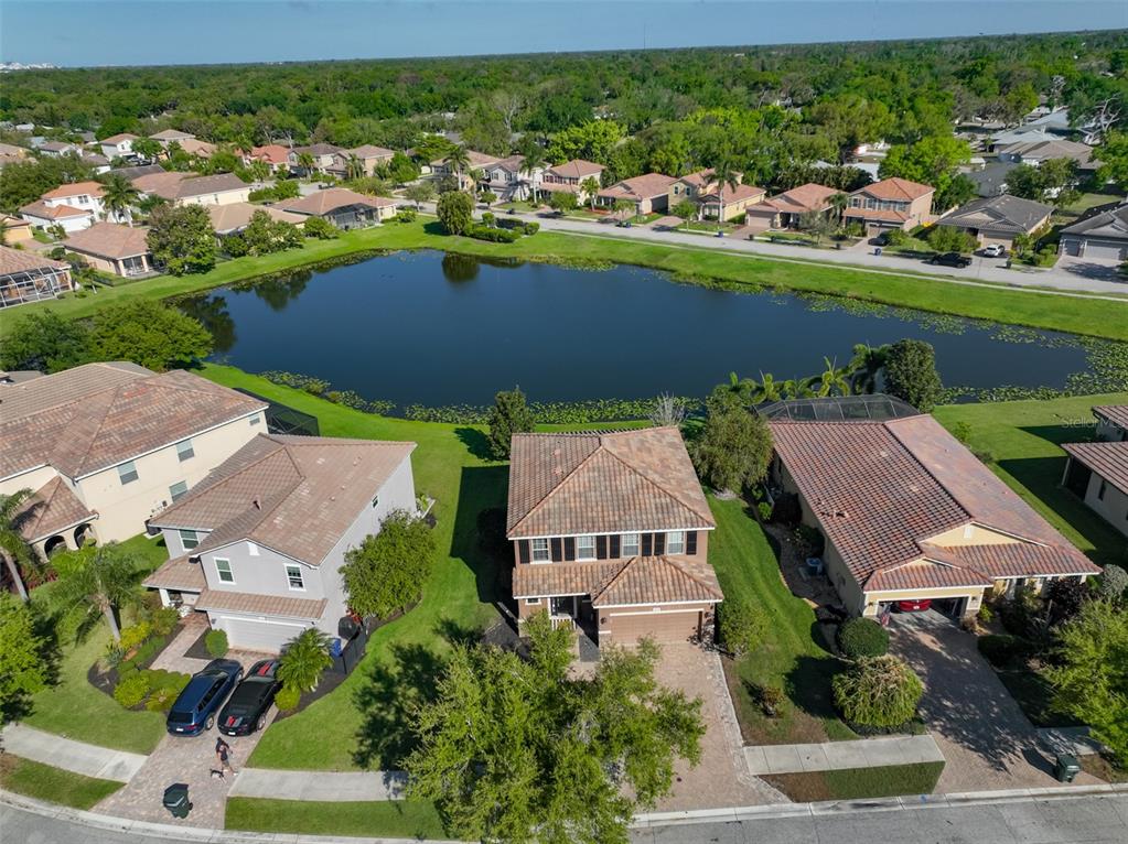 5779 Aaron Court Sarasota, FL 34232 - Photo 35 of 39 an aerial view of a house with a garden