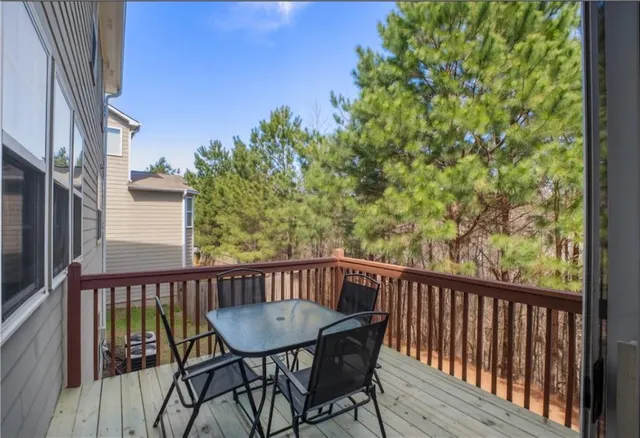 a view of a balcony with a potted plant