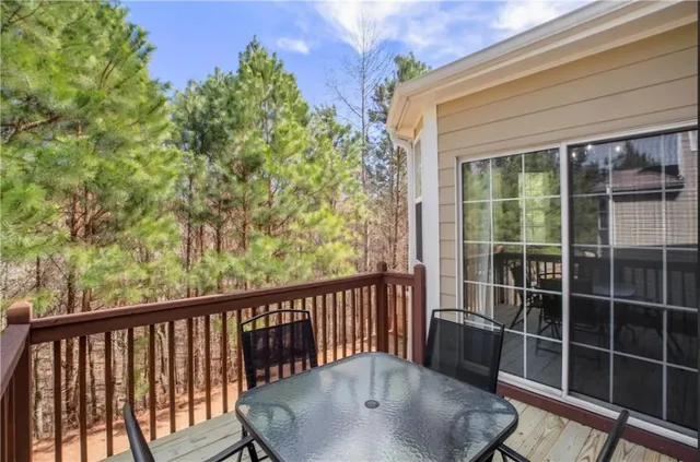a living room with furniture flat screen tv and a fireplace