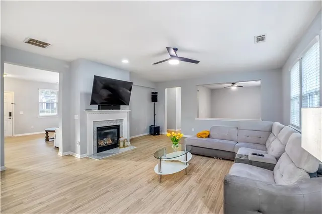a living room with furniture and a window