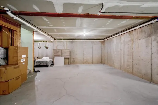 a view of a hallway with stairs