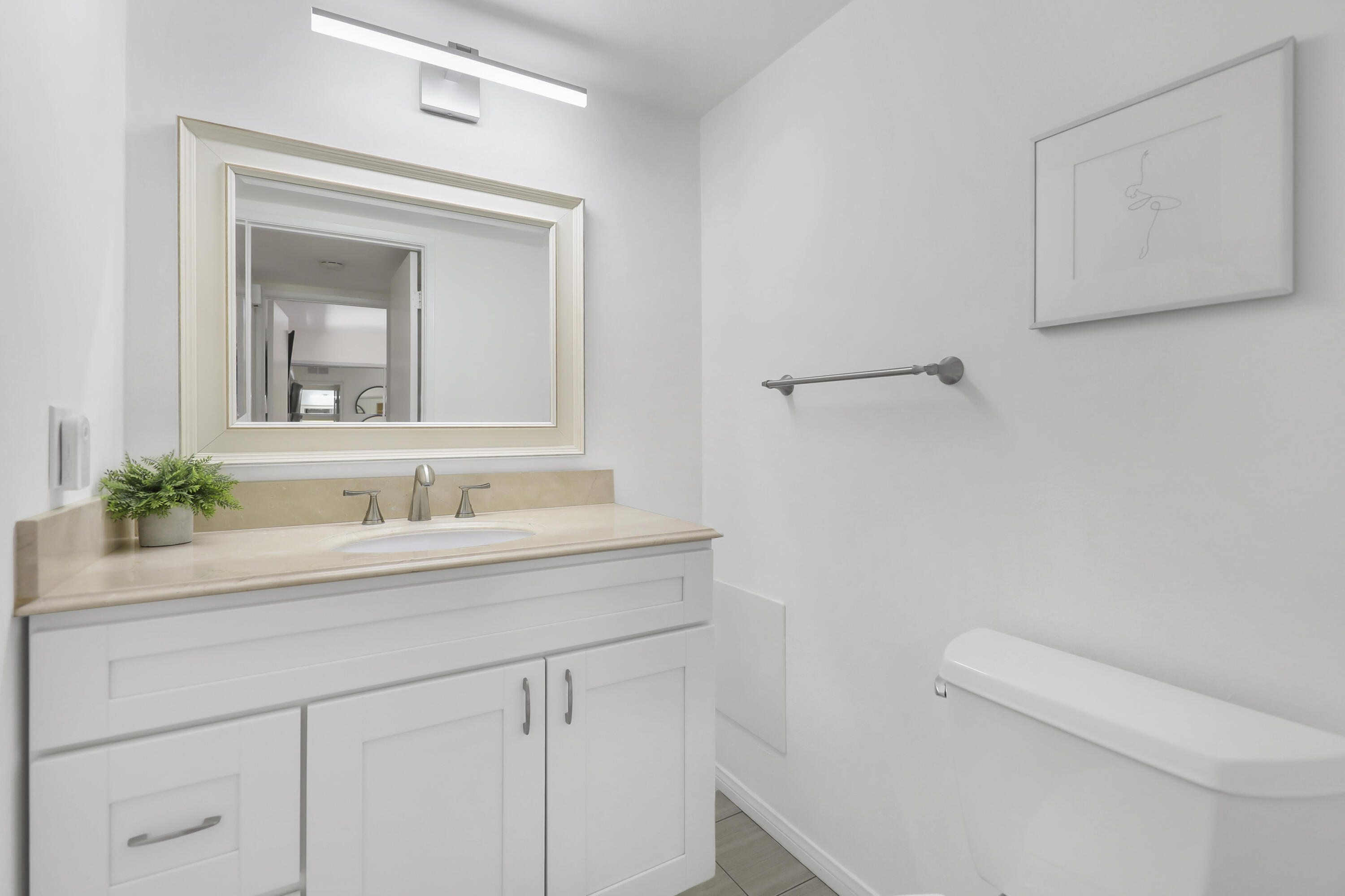 23 Haig Drive Rancho Mirage, CA 92270 - Photo 13 of 29 a bathroom with a sink a toilet and mirror