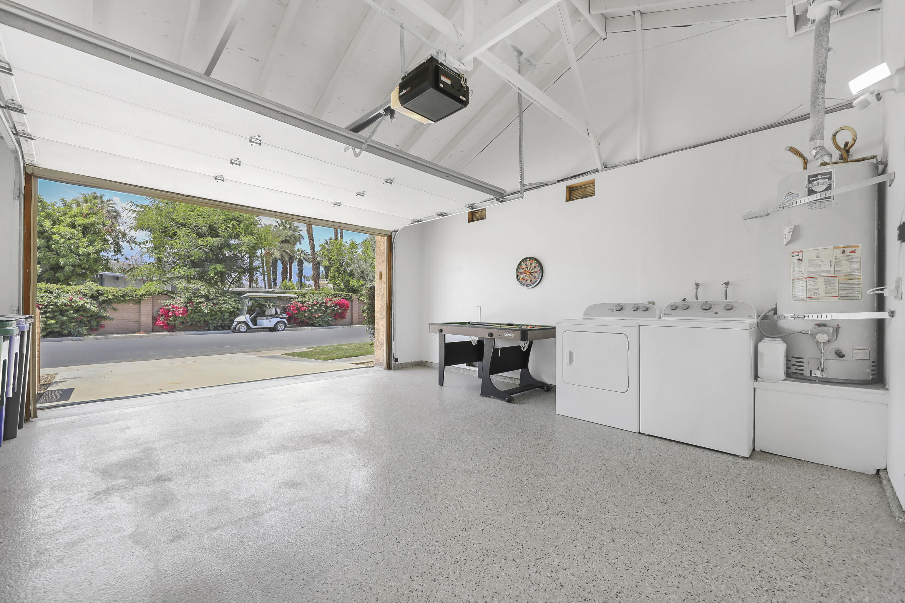 23 Haig Drive Rancho Mirage, CA 92270 - Photo 15 of 29 a view of a garage with furniture