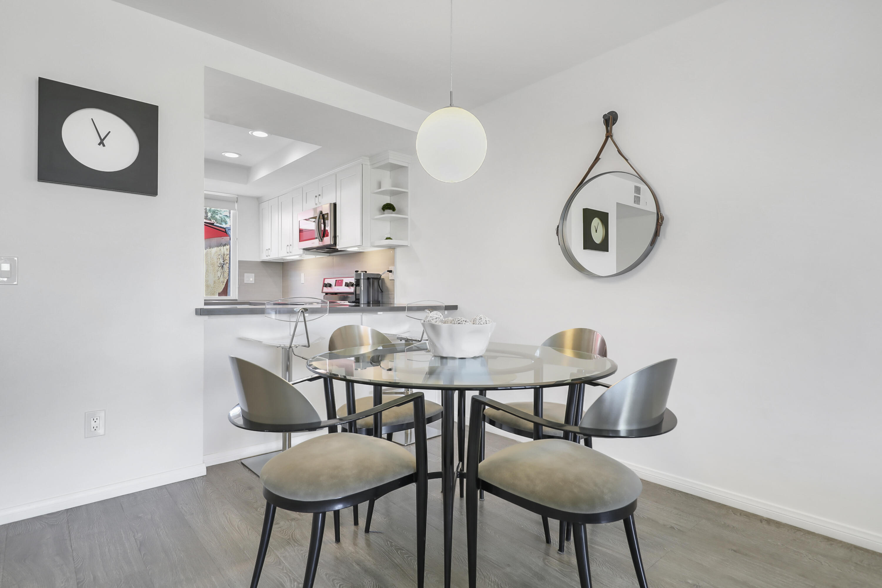 23 Haig Drive Rancho Mirage, CA 92270 - Photo 5 of 29 a view of a dining room with furniture and a mirror