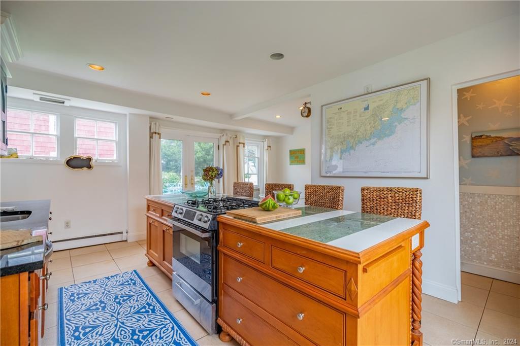 153 4th Avenue Milford, CT 06460 - Photo 12 of 26 Has powder room off kitchen and laundry room
