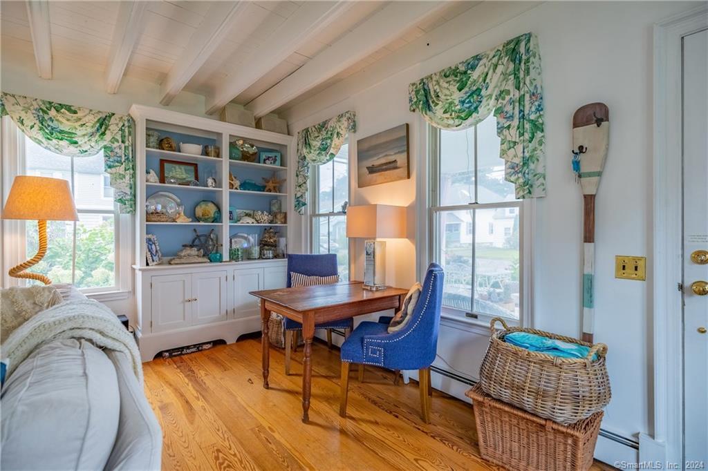 153 4th Avenue Milford, CT 06460 - Photo 6 of 26 Open Living Room has desk space
