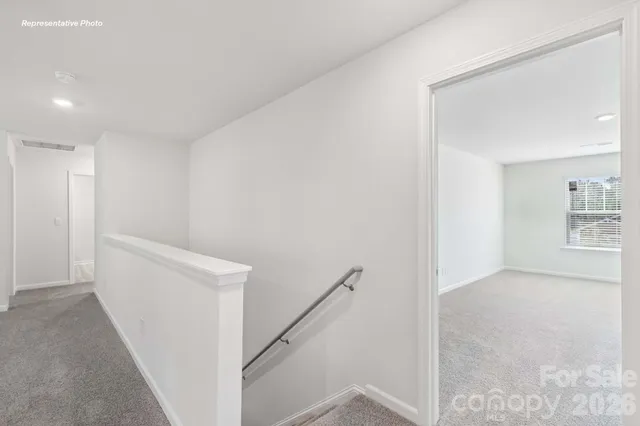 a view of hallway with stairs