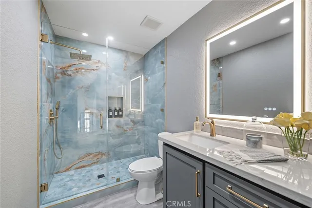 a view of a city with mountains in the background