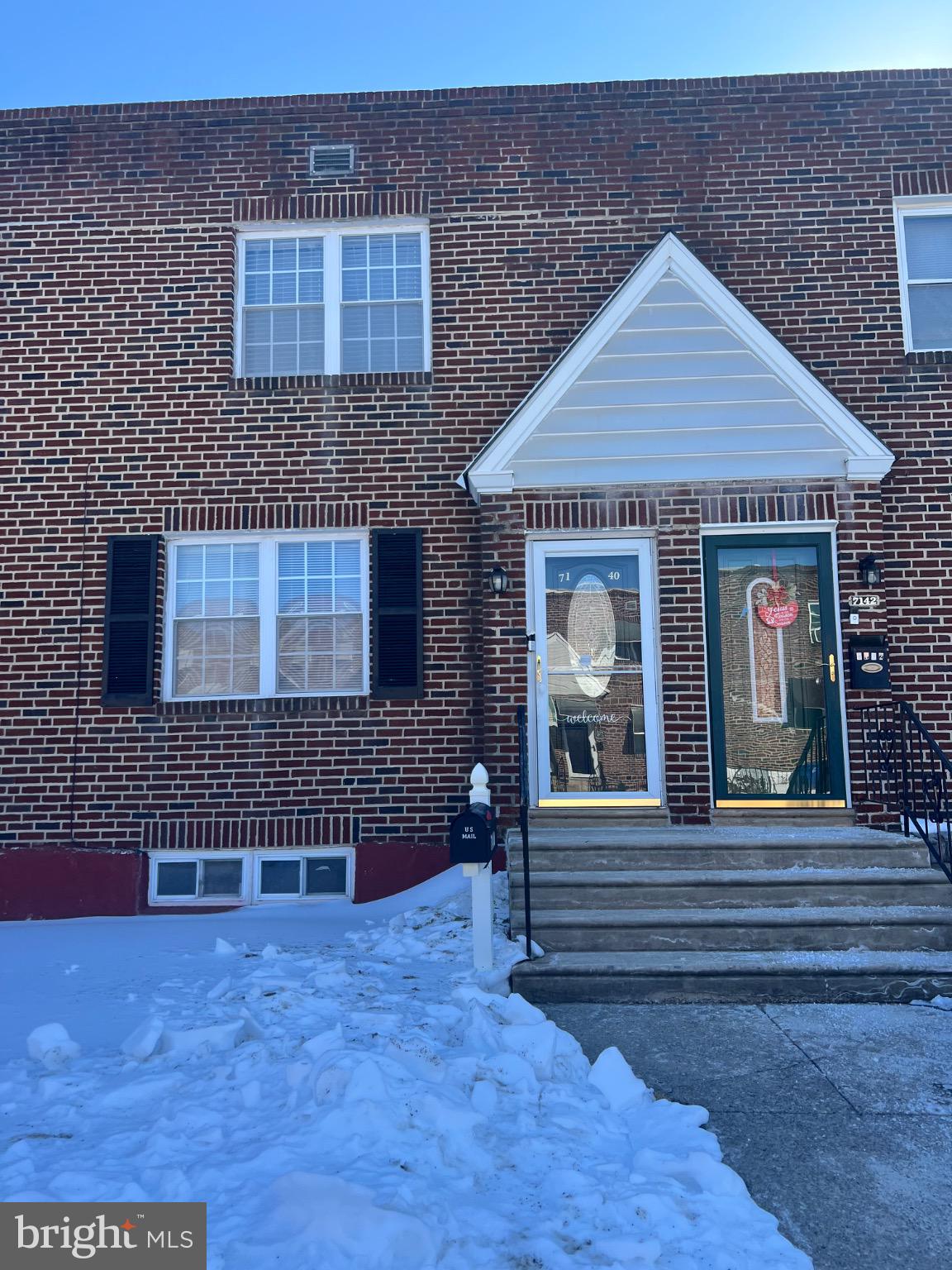 7140 Dorel Street Philadelphia, PA 19153 - Photo 2 of 10 Charming brick facade with inviting entrance.