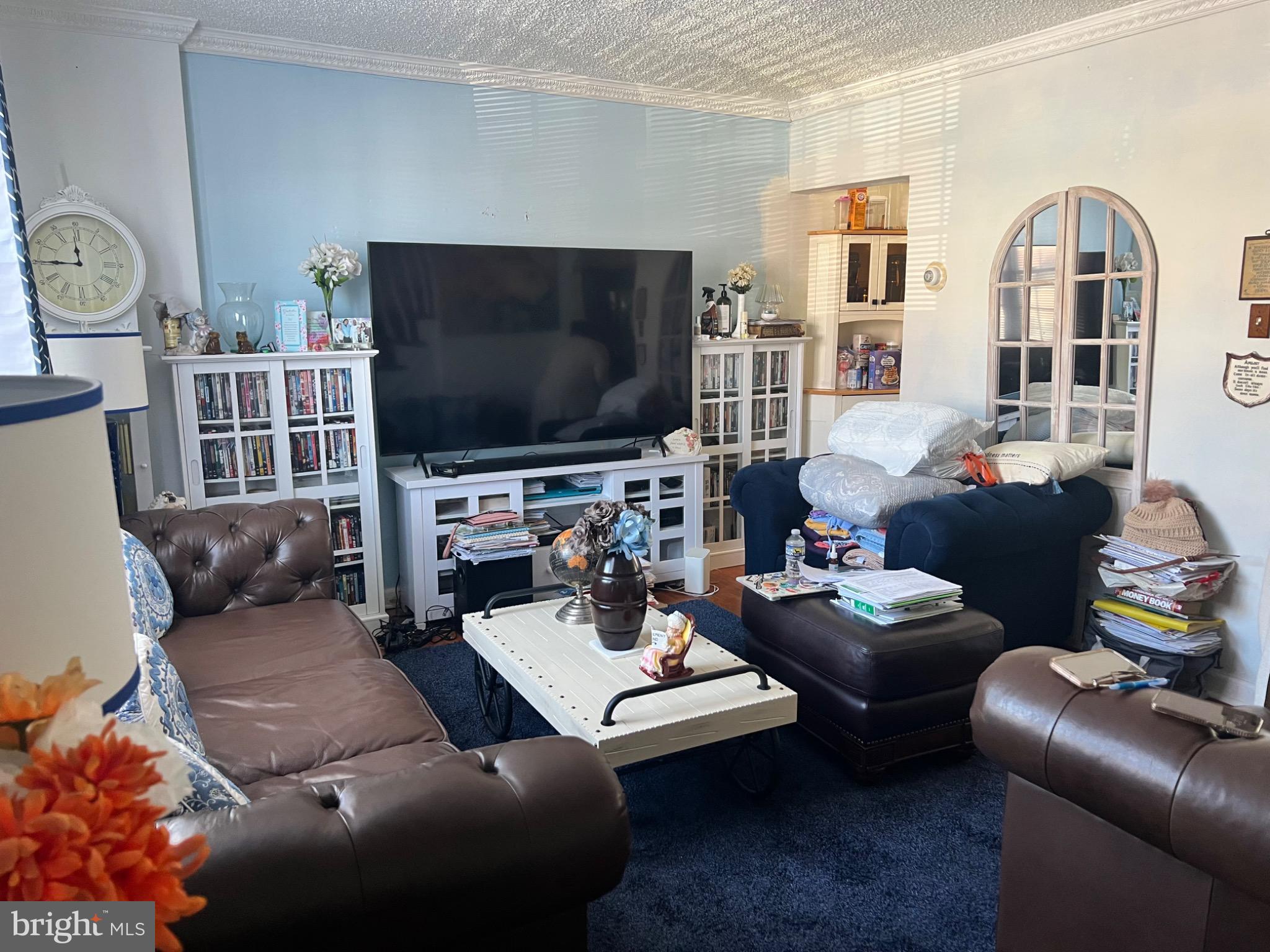 7140 Dorel Street Philadelphia, PA 19153 - Photo 3 of 10 Cozy living room with inviting ambiance.