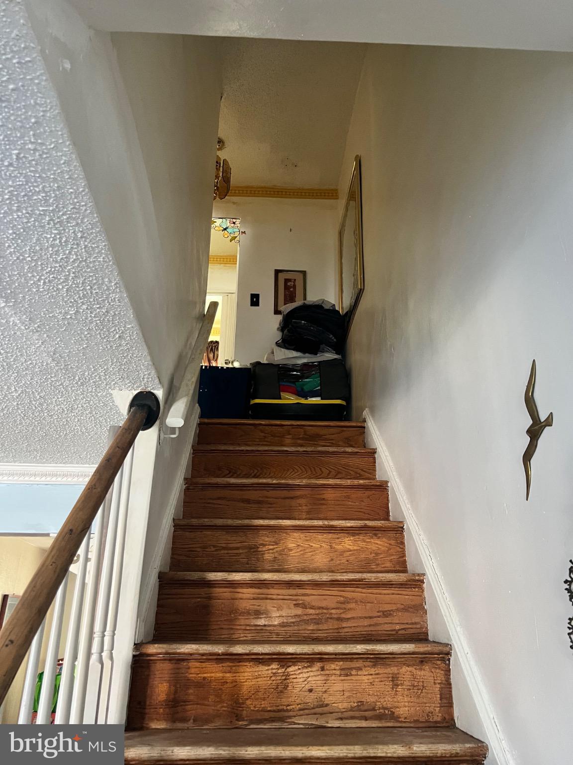 7140 Dorel Street Philadelphia, PA 19153 - Photo 5 of 10 Welcoming ascent to cozy living spaces.