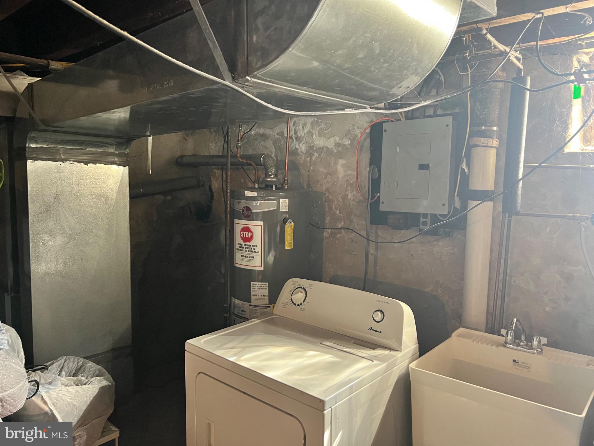 7140 Dorel Street Philadelphia, PA 19153 - Photo 8 of 10 Functional basement laundry area with utilities.