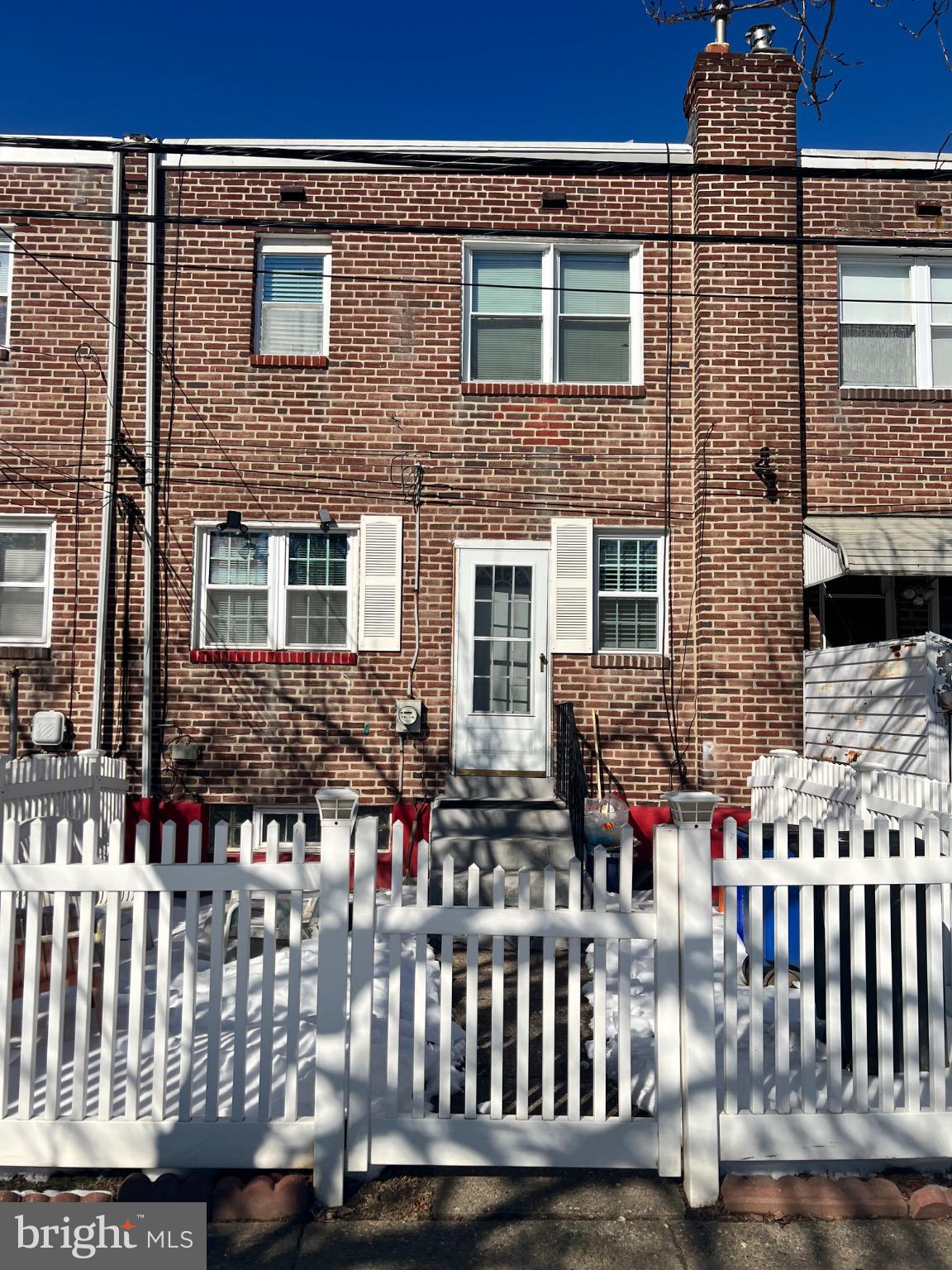 7140 Dorel Street Philadelphia, PA 19153 - Photo 10 of 10 Charming brick home with white picket fence.
