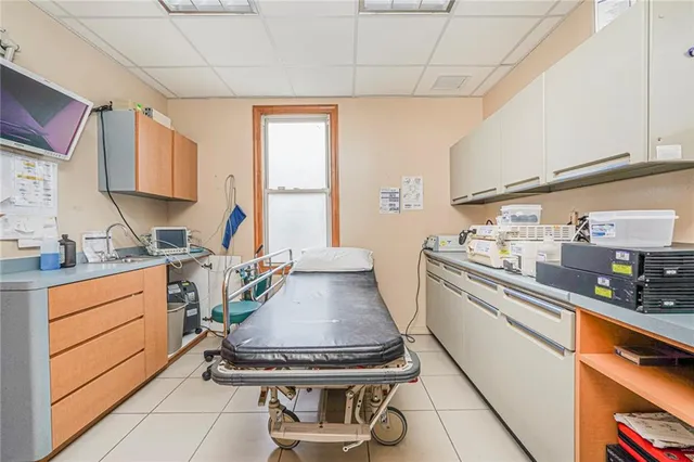 a kitchen with a stove and a sink