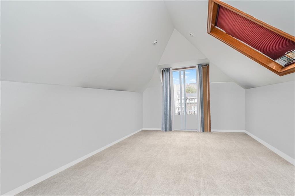 237 Bay Ridge Parkway Brooklyn, NY 11209 - Photo 28 of 30 a view of an empty room with a window