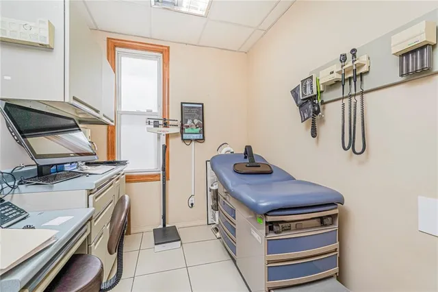 a kitchen with a stove and a sink
