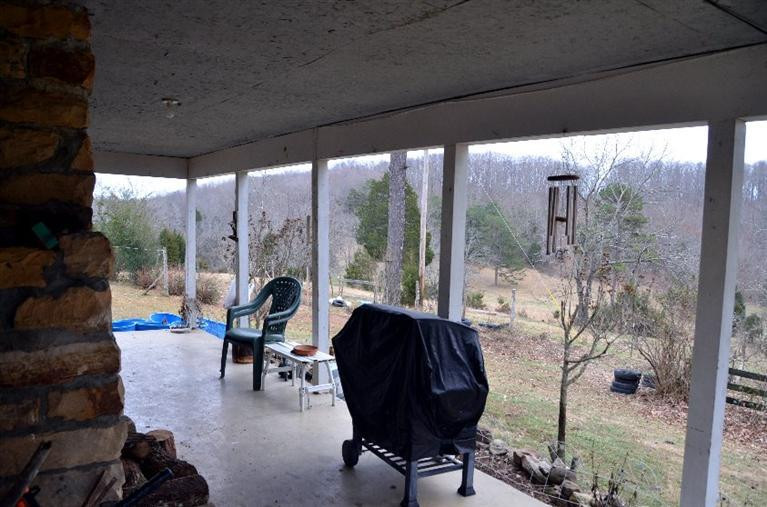 1709 Macedonia Road Irvine, KY 40336 - Photo 33 of 87 Concrete wrap around porch!