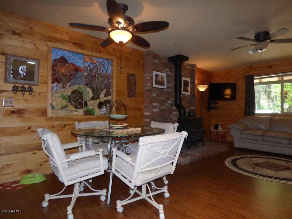 8560 Elk Road Strawberry, AZ 85544 - Photo 8 of 24 Dining area & stained glass insert