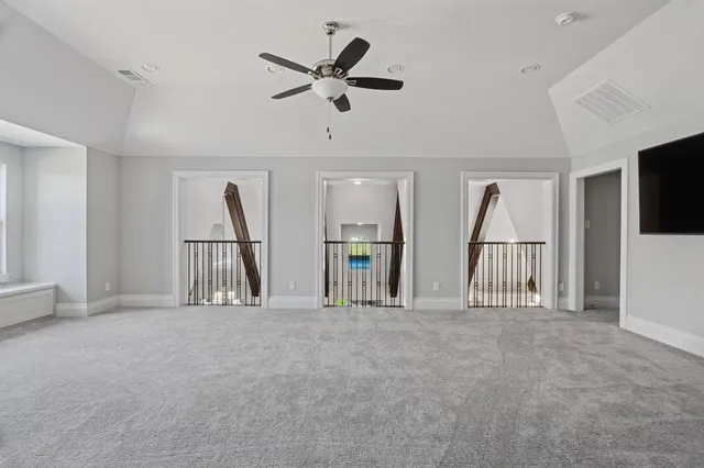 a view of a livingroom with a ceiling fan