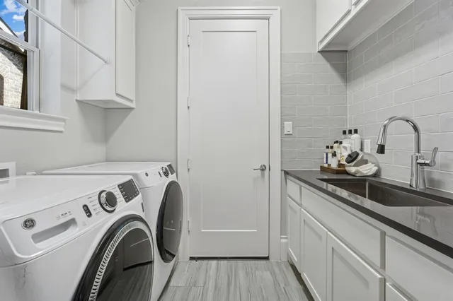 a view of kitchen and sink