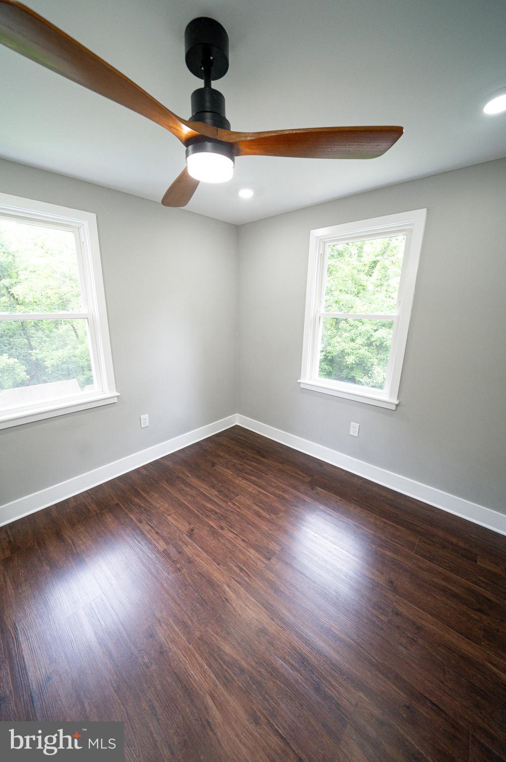 334 Church Road, Unit 2 Elkins Park, PA 19027 - Photo 34 of 38 a view of an empty room with wooden floor and a window