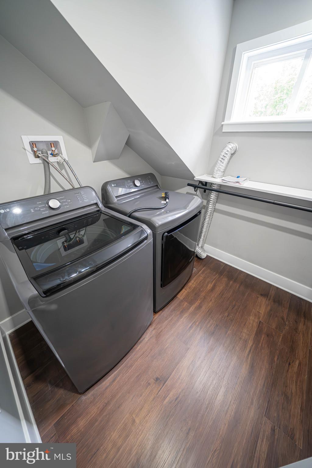 334 Church Road, Unit 2 Elkins Park, PA 19027 - Photo 37 of 38 a view of washer and dryer with wooden floor