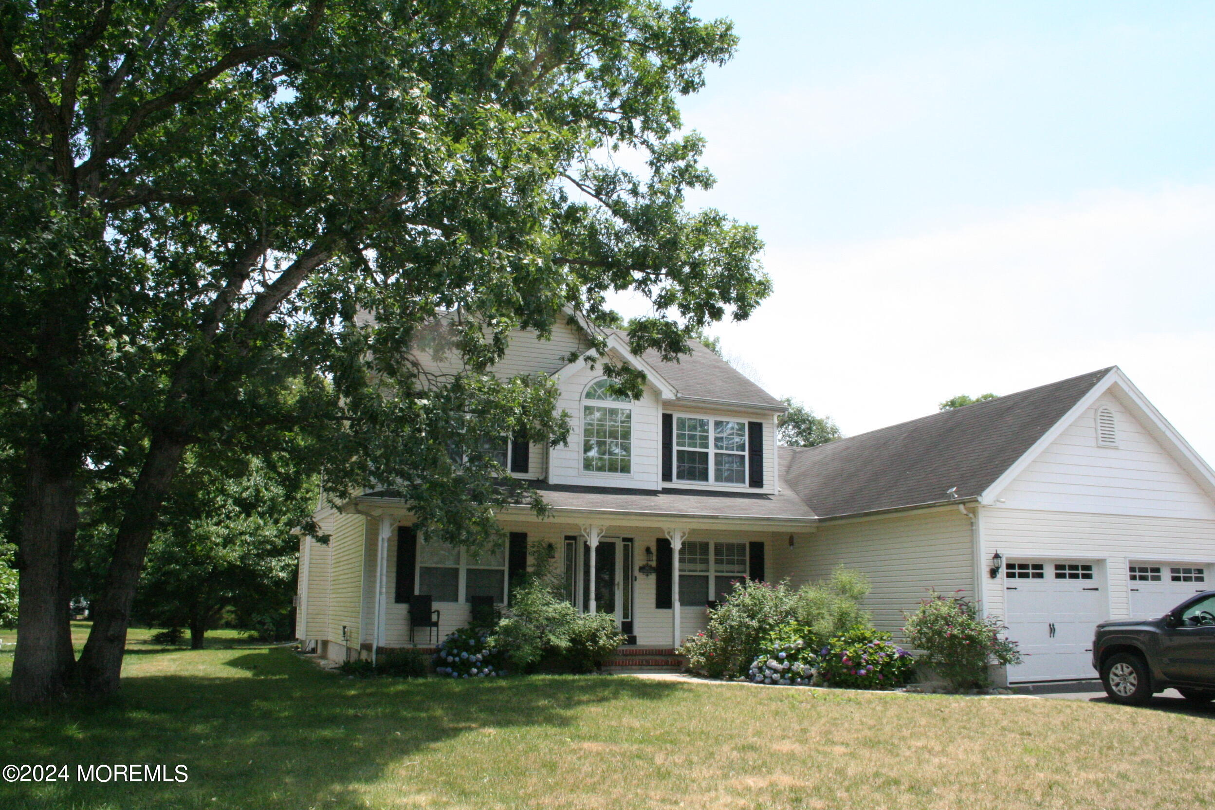 front view of house with a yard