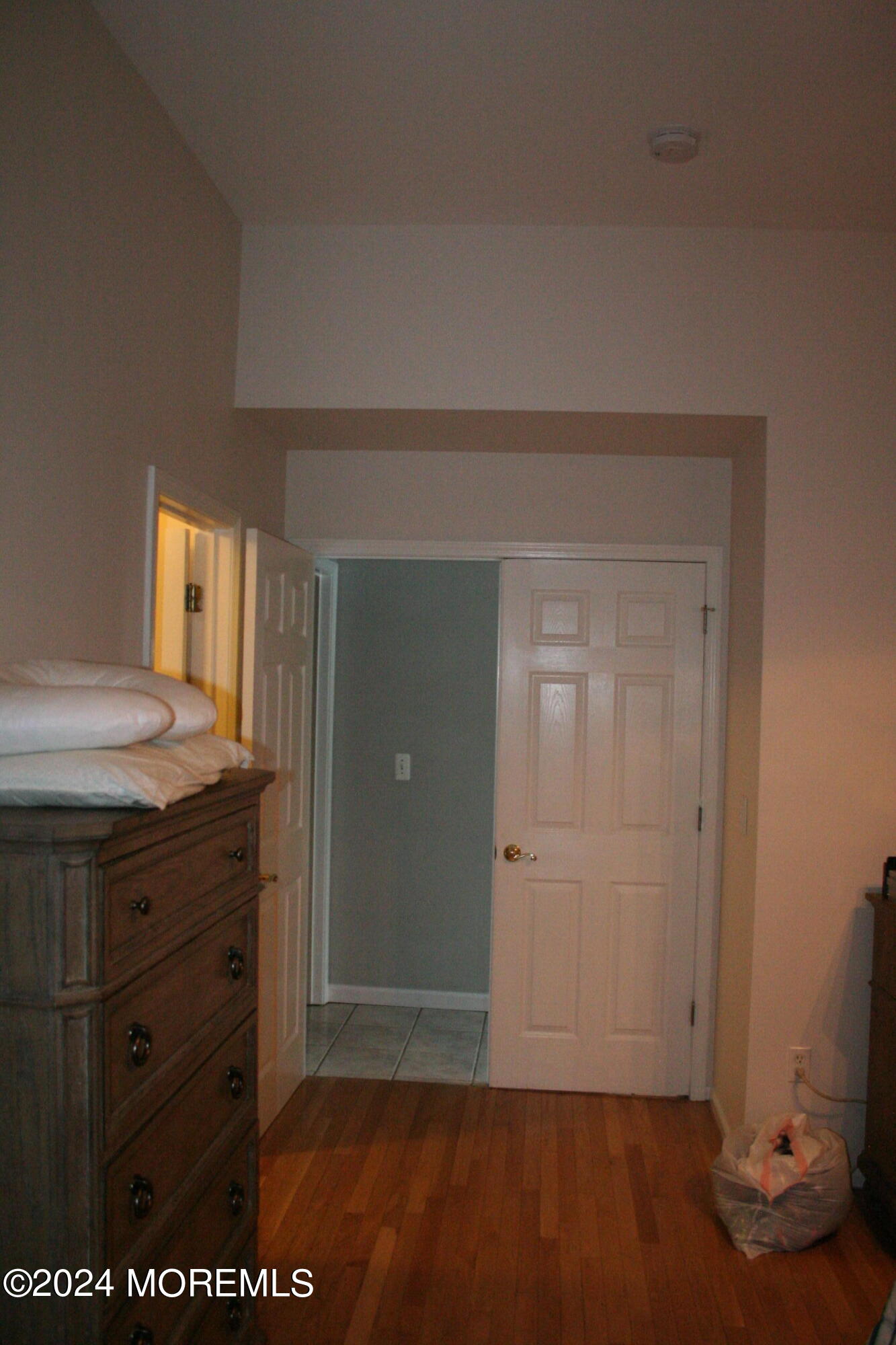 307 Lighthouse Drive Manahawkin, NJ 08050 - Photo 26 of 47 an empty room with wooden floor cabinet and closet