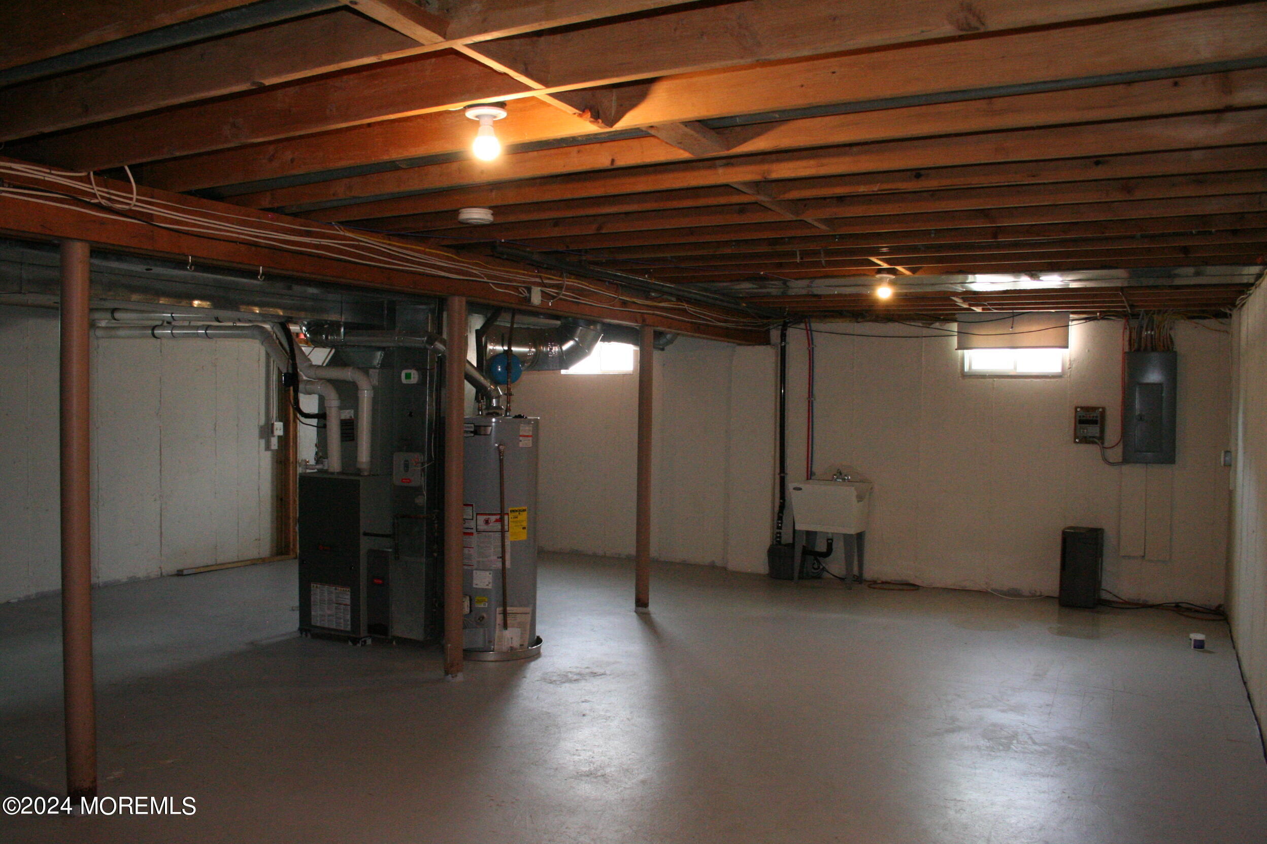 307 Lighthouse Drive Manahawkin, NJ 08050 - Photo 41 of 47 a view of empty room with wooden floor