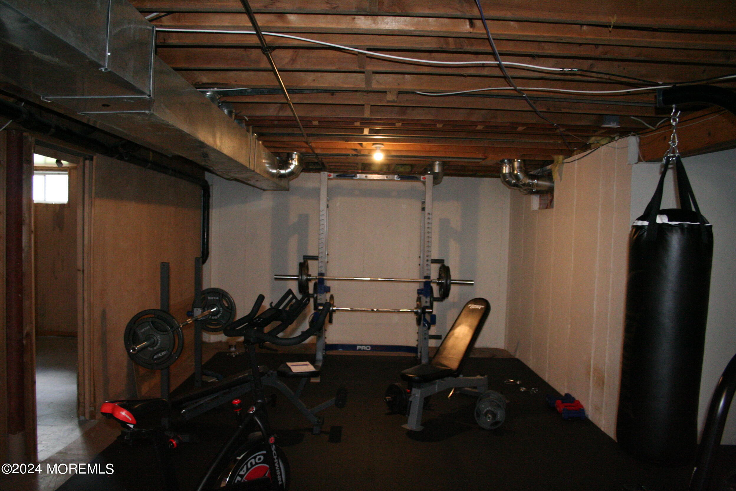 307 Lighthouse Drive Manahawkin, NJ 08050 - Photo 45 of 47 a view of a room with gym equipment