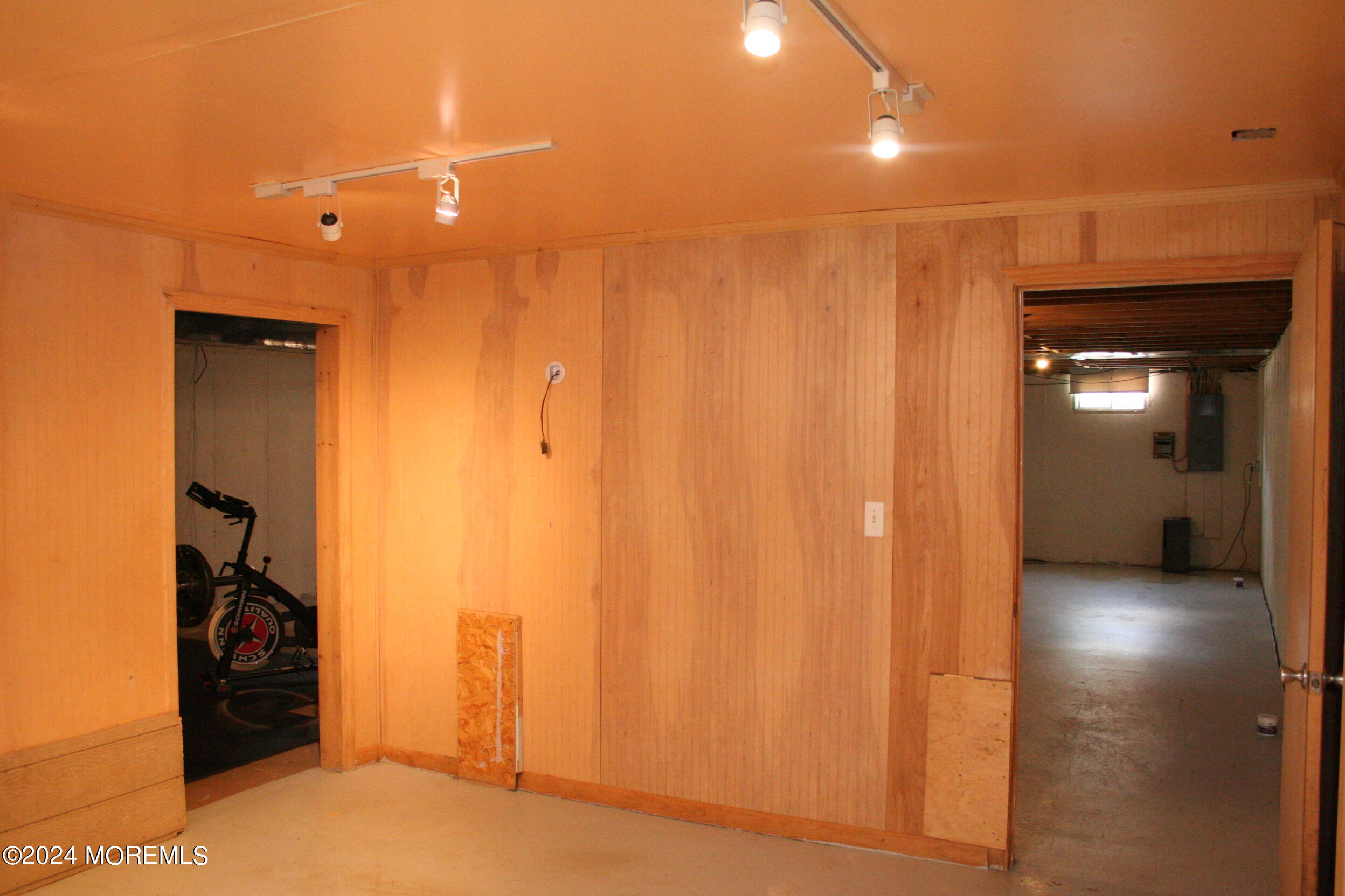 307 Lighthouse Drive Manahawkin, NJ 08050 - Photo 47 of 47 a view of a livingroom with a hallway