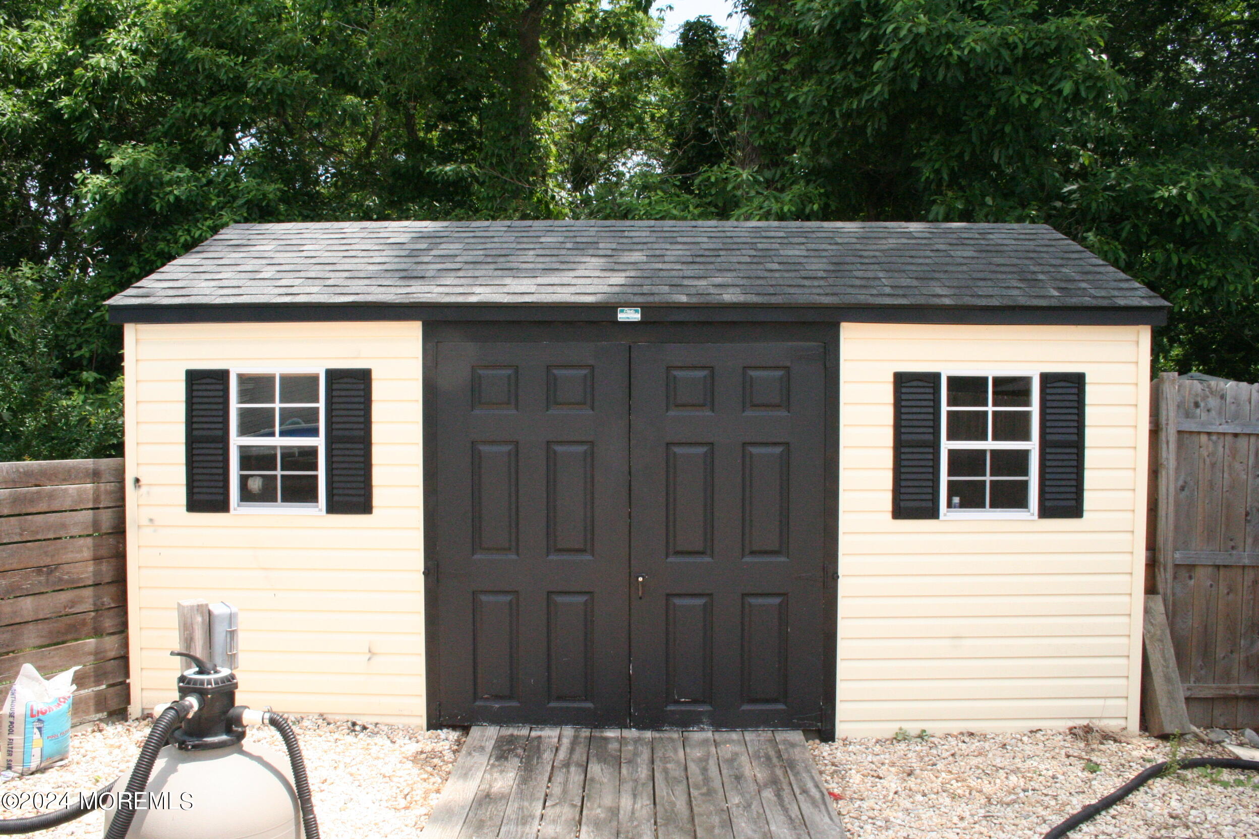 307 Lighthouse Drive Manahawkin, NJ 08050 - Photo 8 of 47 a house view with a outdoor space