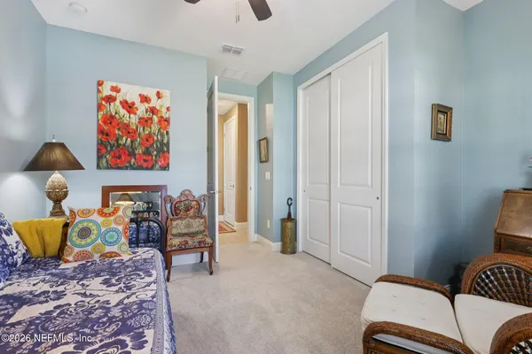 a living room with furniture and a couch