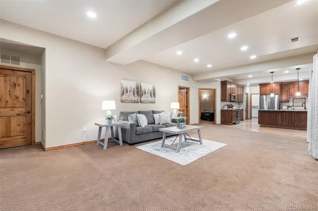 a living room with furniture and a table