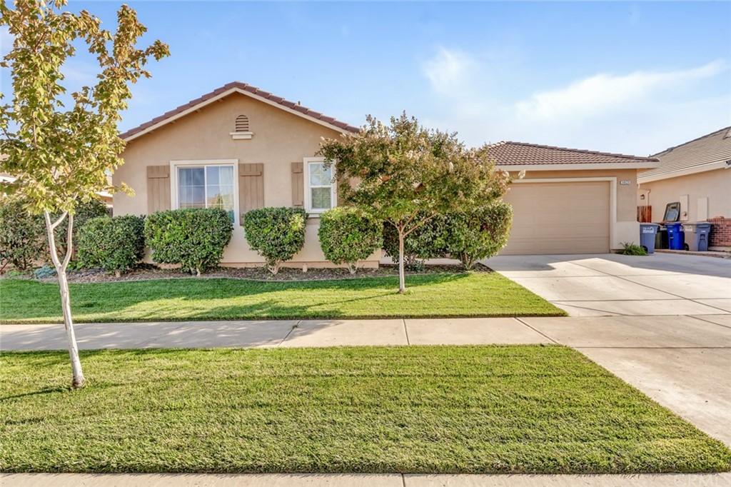 4925 Durant Way Merced, CA 95348 - Photo 1 of 1 a view of a house with a yard