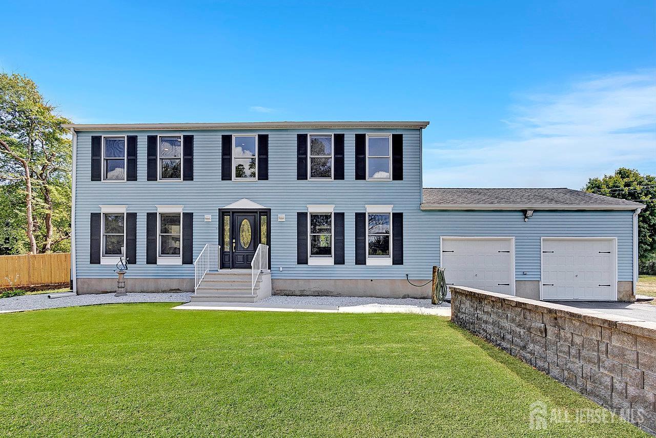 front view of house with a yard