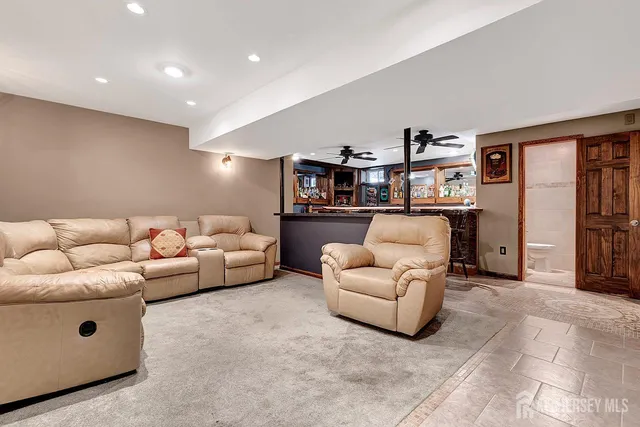 a living room with furniture and a couch