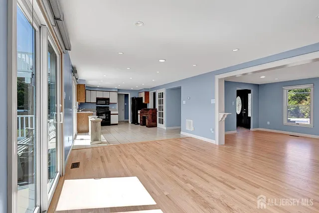 a view of livingroom with hardwood and furniture