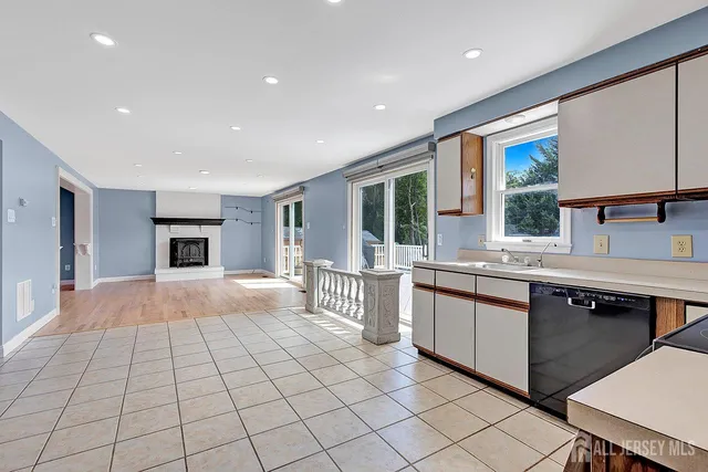 a large kitchen with a large window