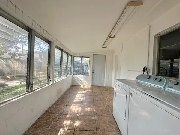 a view of a lake with houses in the back