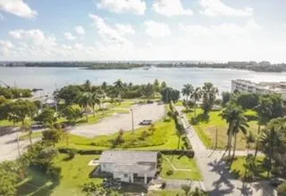 a view of an chairs and table in the patio