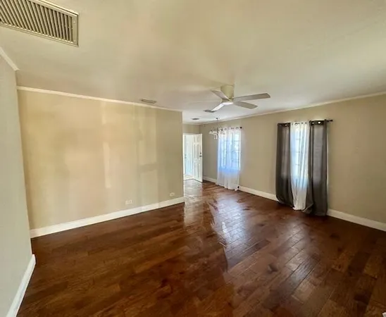 a kitchen with a stove and a refrigerator