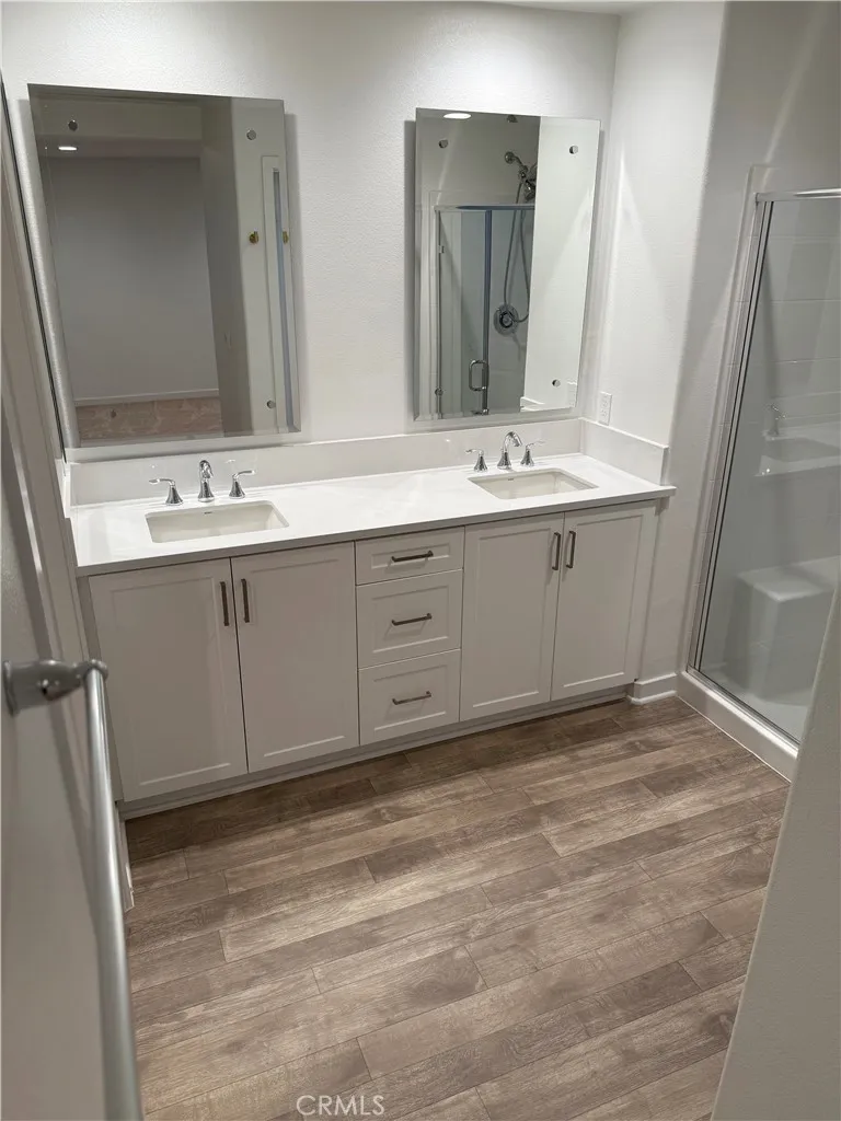 9504 North Corterra Panorama City, CA 91402 - Photo 18 of 24 a bathroom with a sink and a mirror