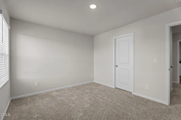 an empty room with an entryway