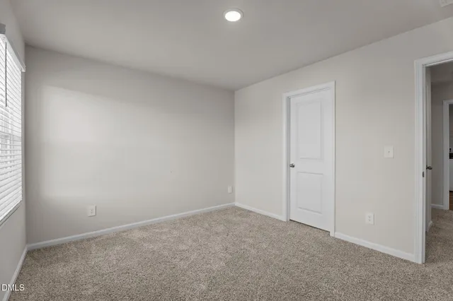 an empty room with an entryway