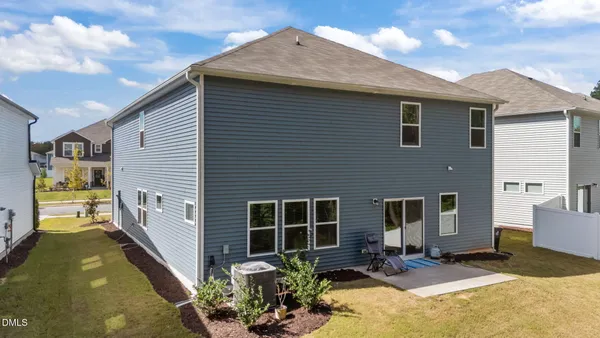 a front view of a house with patio